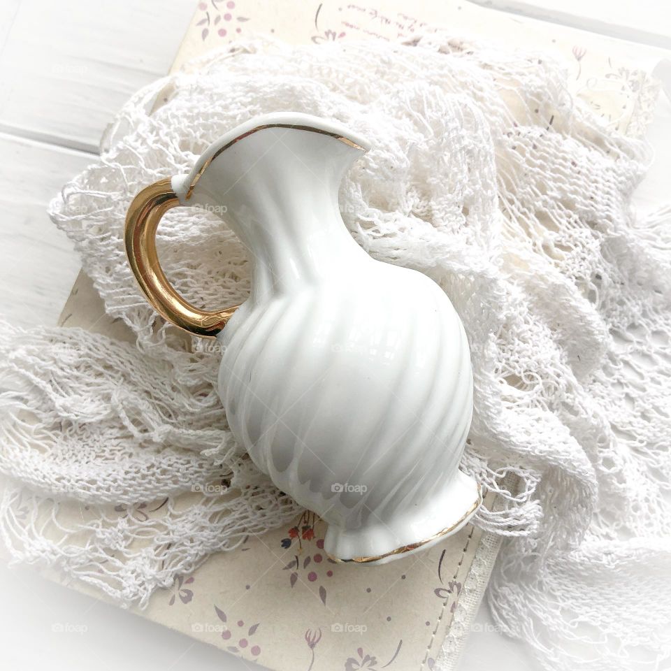 White old porcelain small vase with golding 