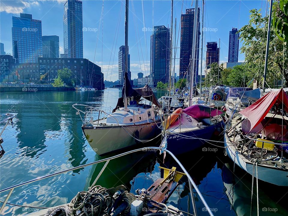 This is “Newtown Creek” by the “Pulaski Bridge” in LIC, Queens seen from one of the many boats that are tied to the shore here, the “Salvation”, the “28 ft 1969 Luhrs” cabin cruiser we call home. 2023. Hypnotic Productions