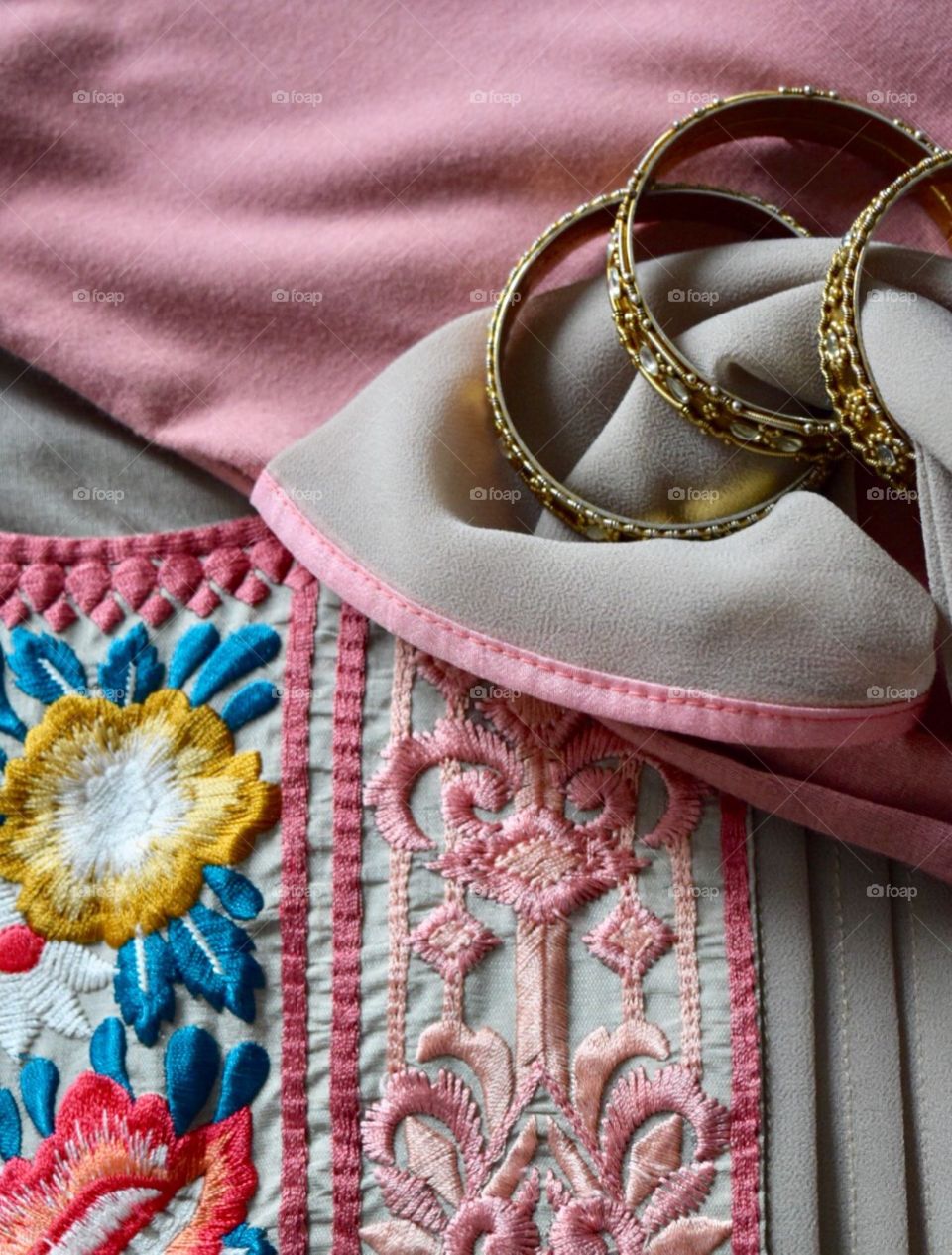 High angle view of bangles with fabric