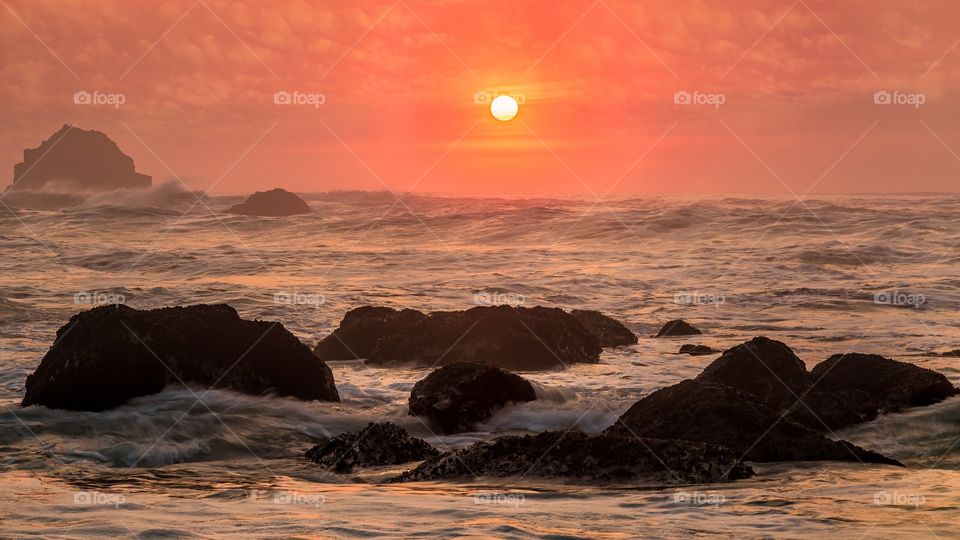 Sunset Over an Angry Ocean