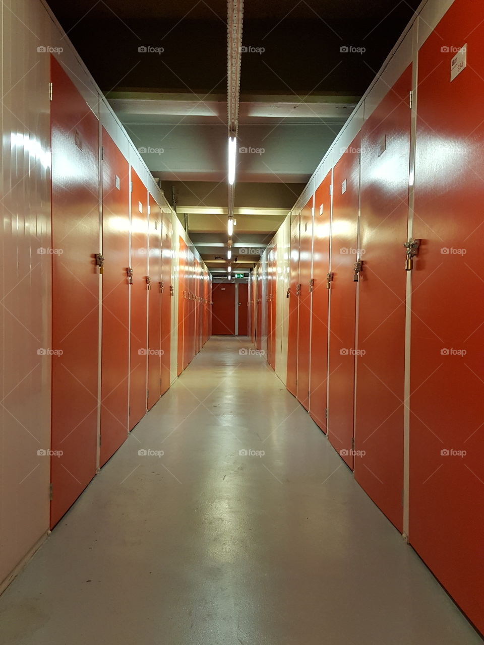 Long corridor with storage rooms in a storage facility