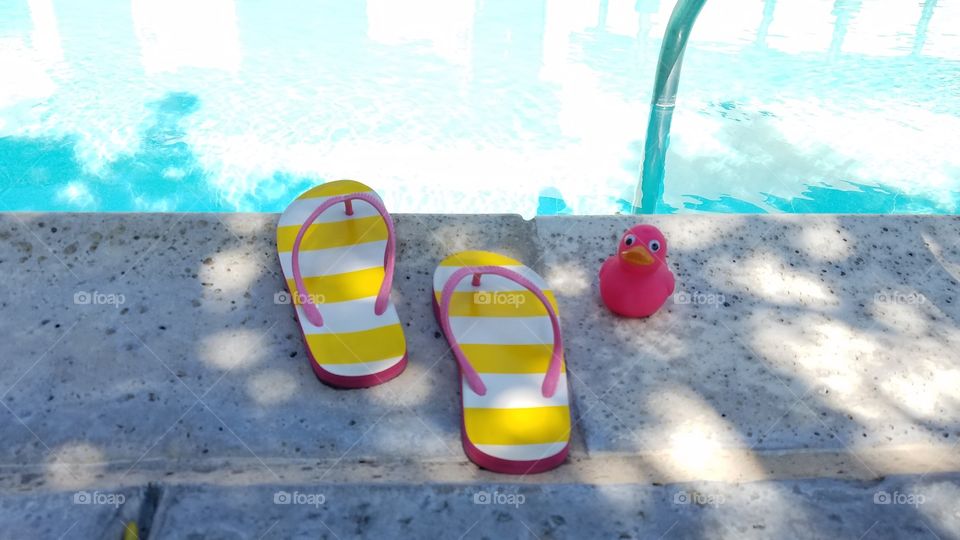 Pink duck and flip flops