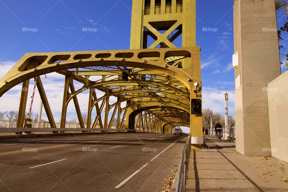 the famous Golden bridge with the blue skies in the background in the state Capitol of Sacramento California.
