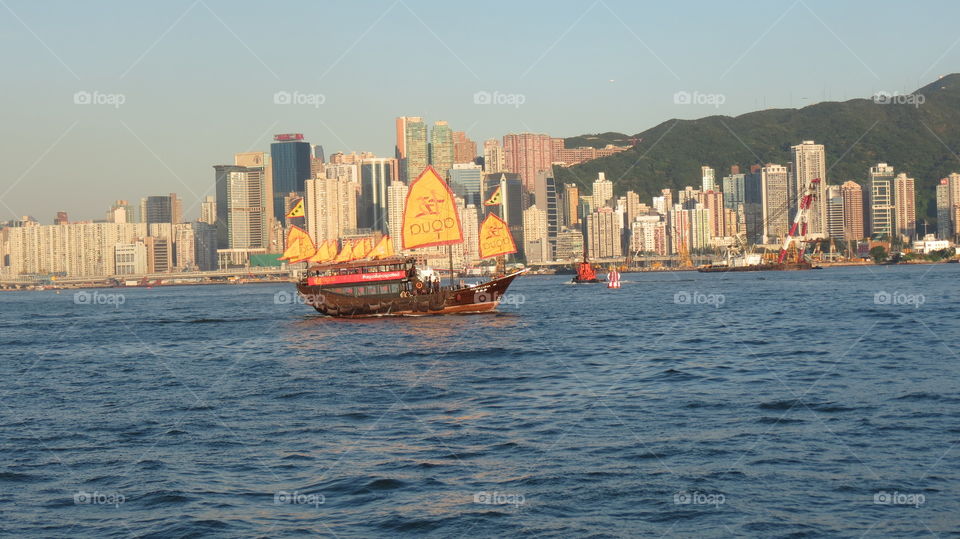 Kowloon Bay, Hong Kong, Boat, Sea, HK, City View, Coastal View, Urban, Buildings, Waterway, Ferry, Transportation, History, Nautical, Boat Fare, China, Boating, Rich History, Trading Goods, Wave, Ocean 