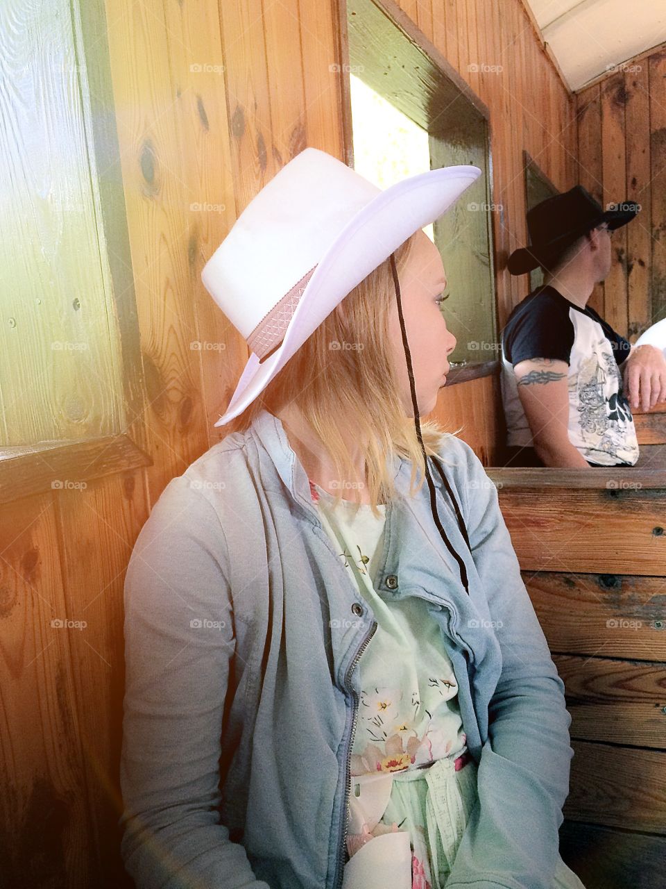 Cowboys. People sitting in an old western train