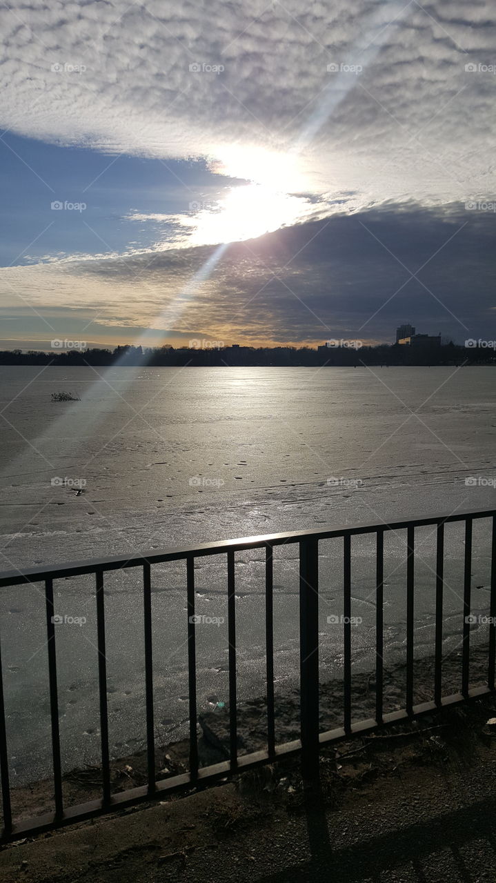 Beams of light - Sun Setting on Lake Calhoun - Minneapolis Minnesota