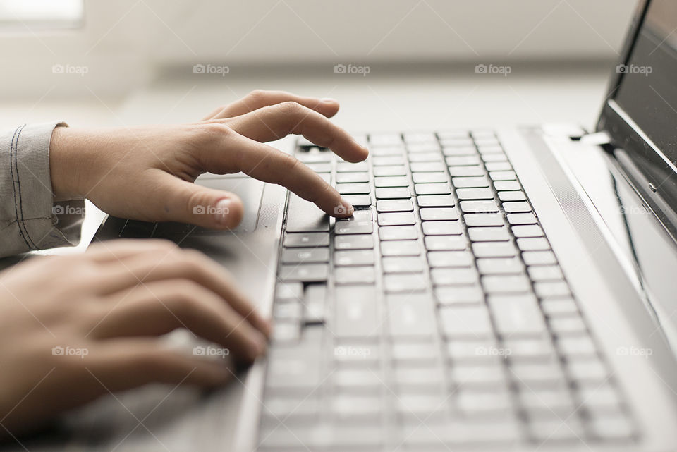 Child with laptop