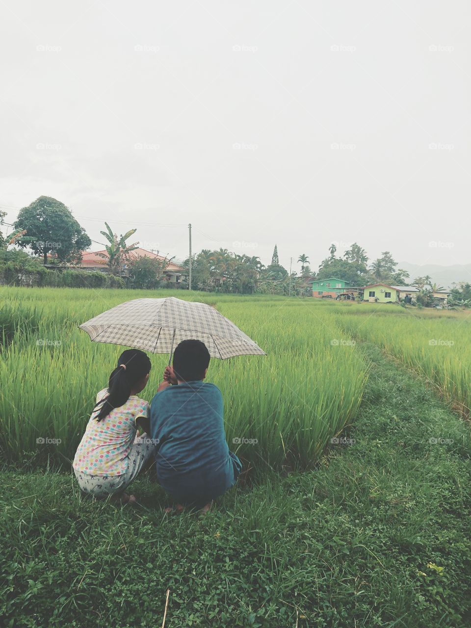 These two kids so like with the rain