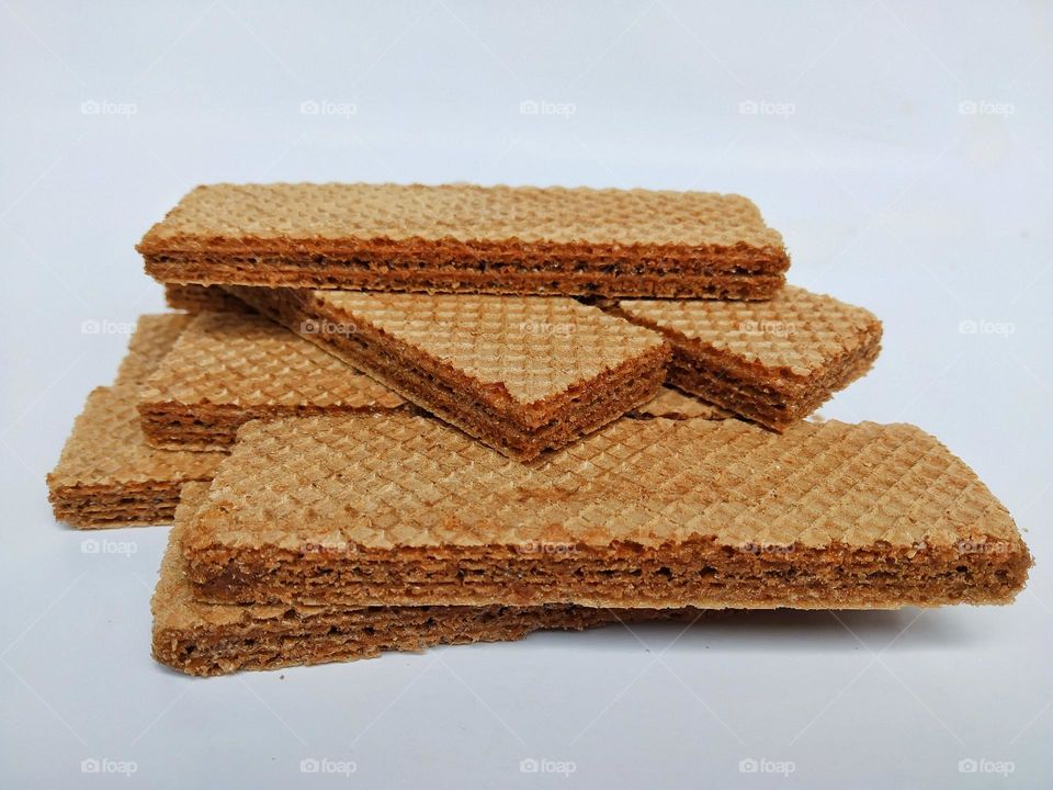 A pile of wafers on a white background