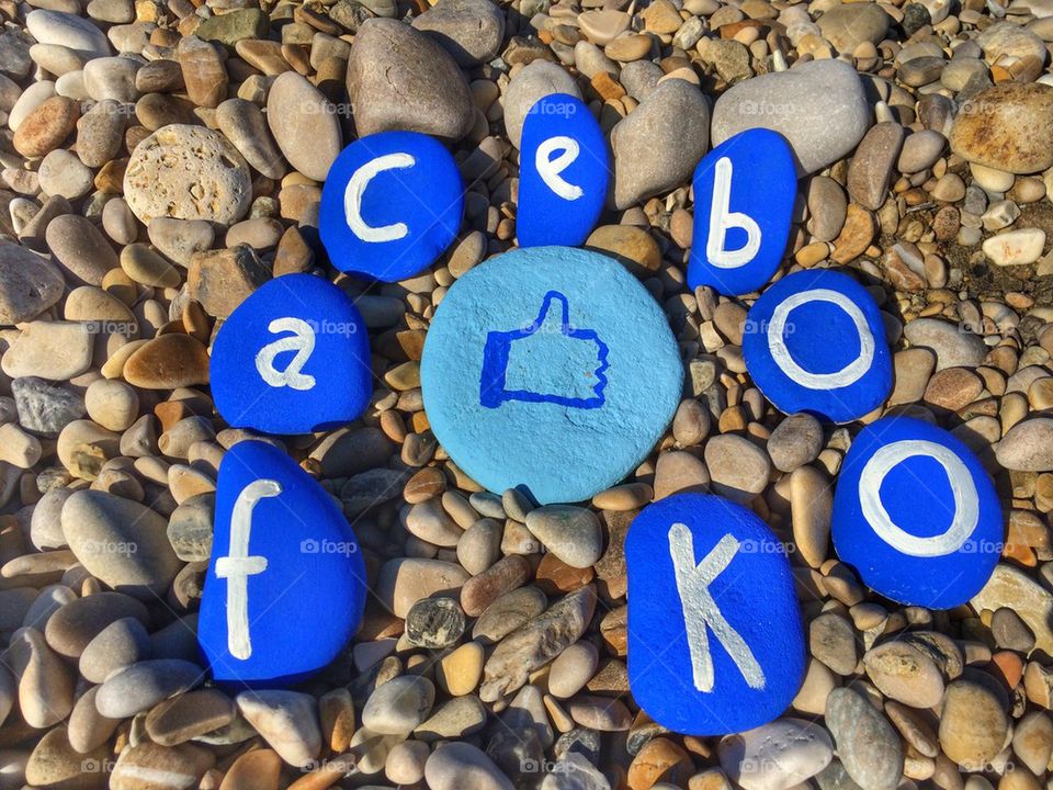 Facebook concept on stones and pebbles