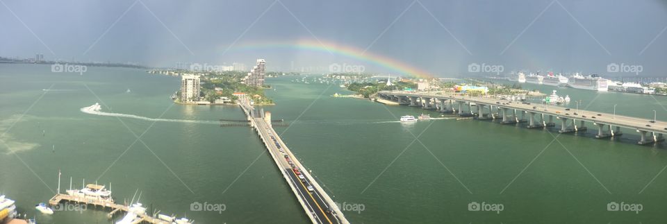 Rainbow over Miami panoramic view