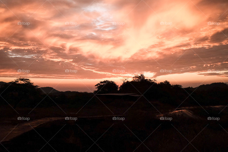 Sunset with red clouds and sky with clouds