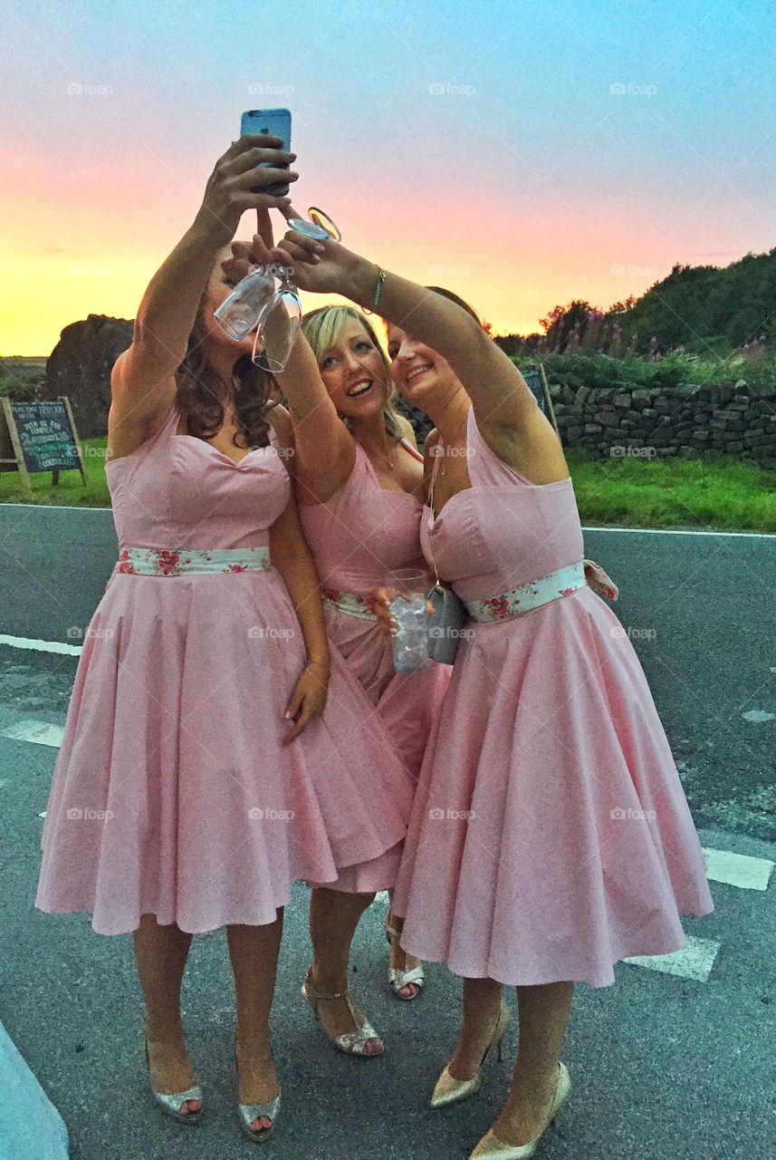 Bridesmaids taking a selfie