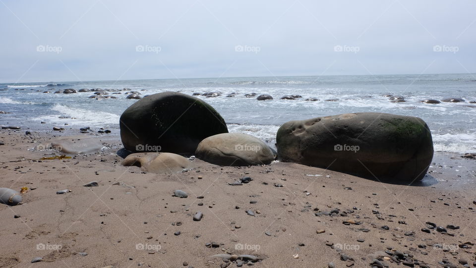 Rocks on an empty beach