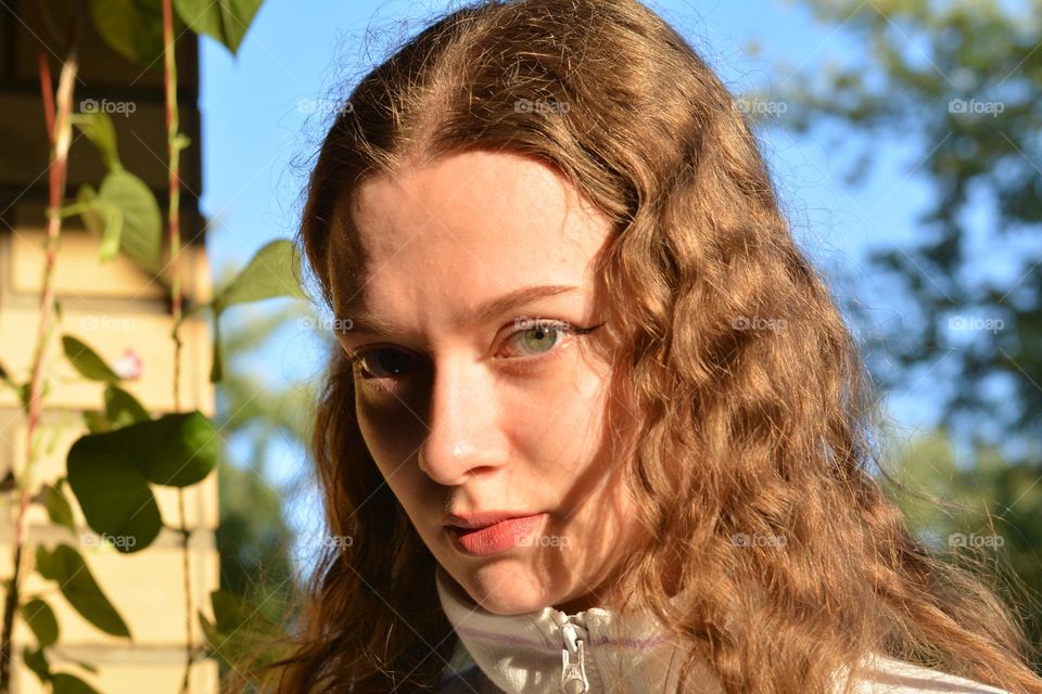 young girl beautiful portrait in sunlight