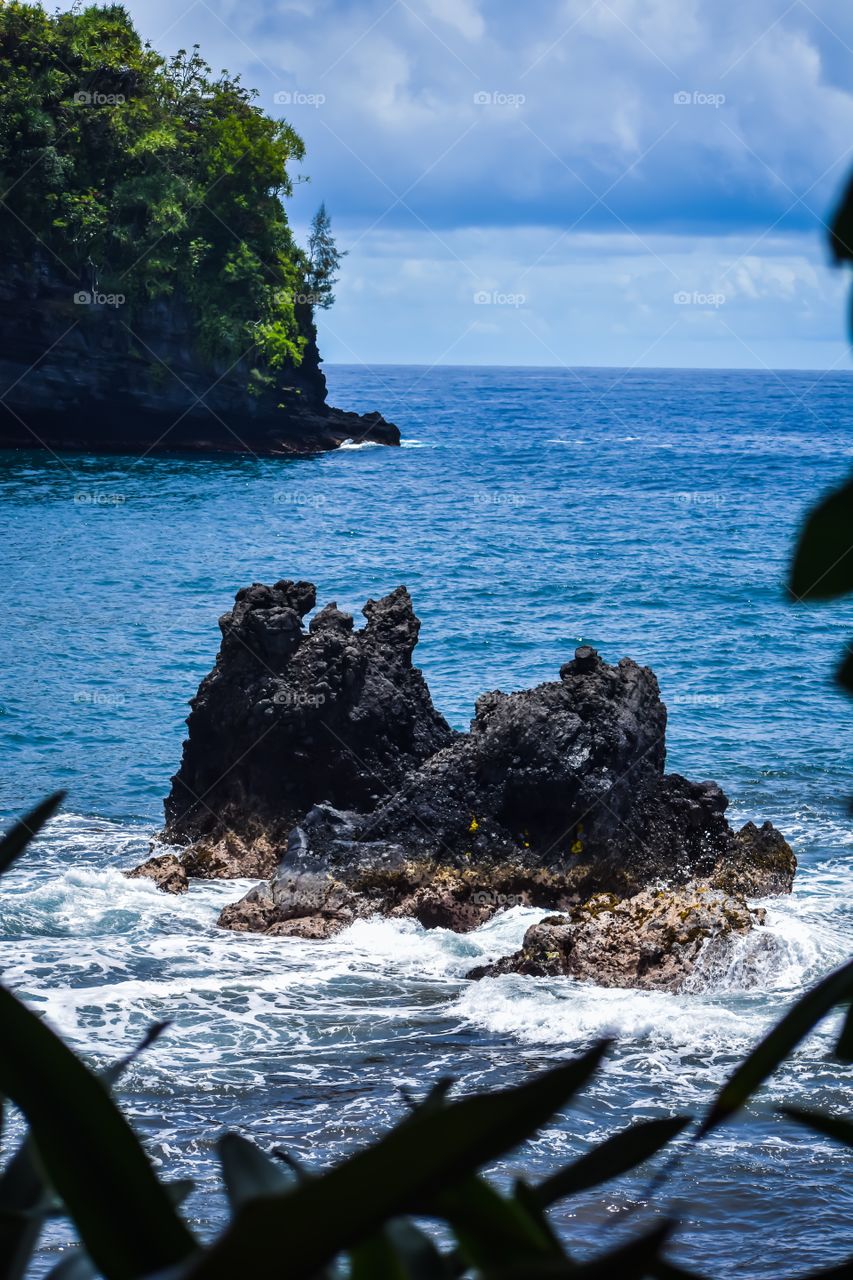 The Legend of the Twin Rocks tells of the origin of two rock formations at the head of Onomea Bay that are said to be a young man and woman, known as the lovers of Kahali’i.