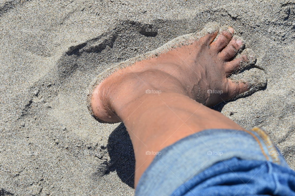 foot in the sand at Stanton Beach California on a beautiful spring day