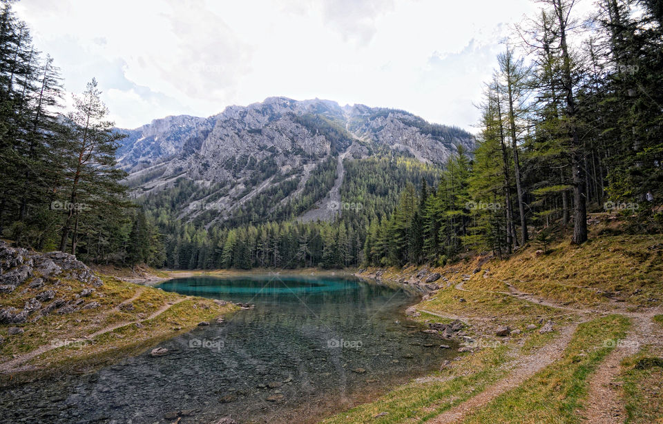 Hiking around the green lake at styria, austria