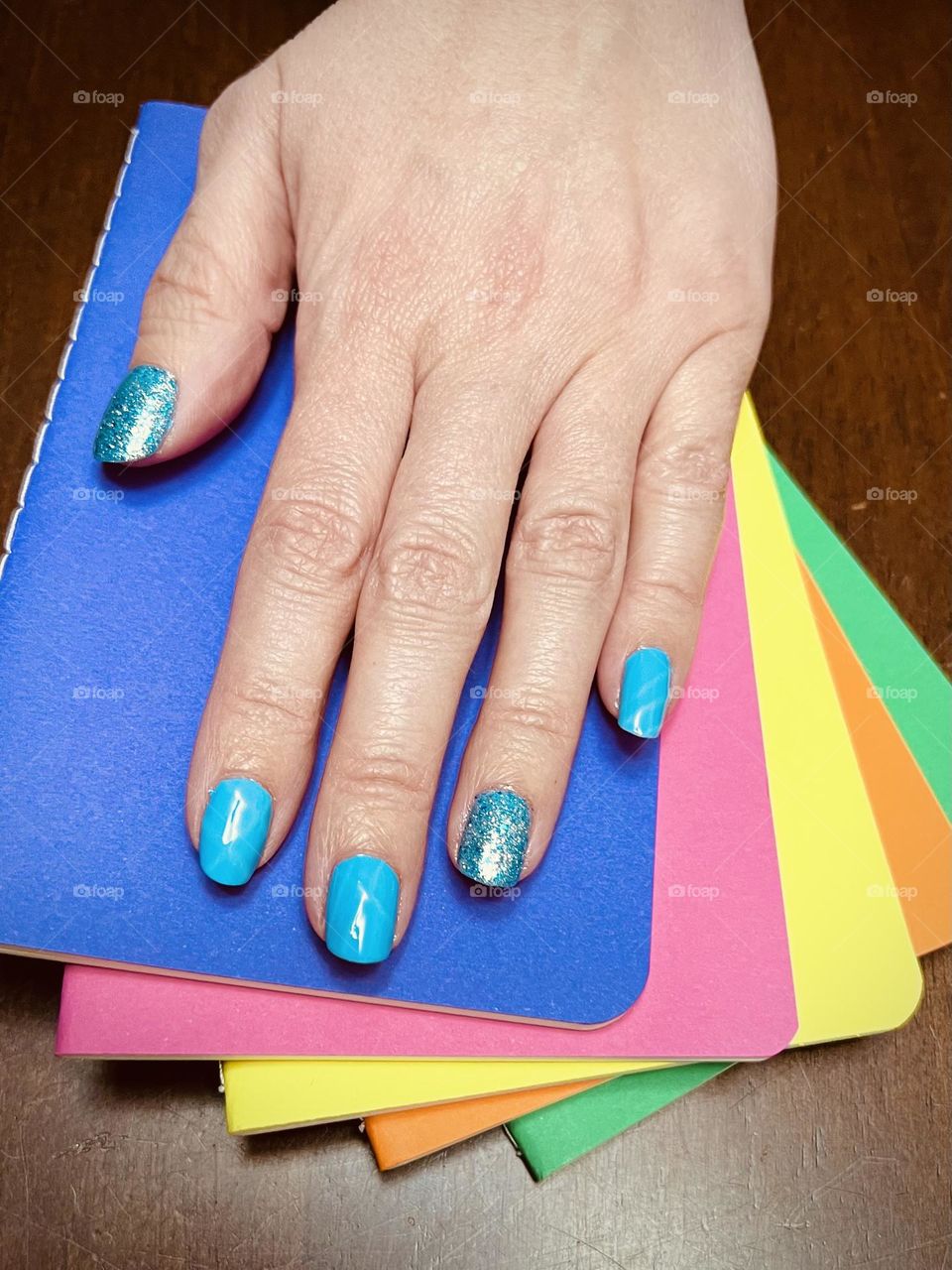 Bright blue gel nail manicure 