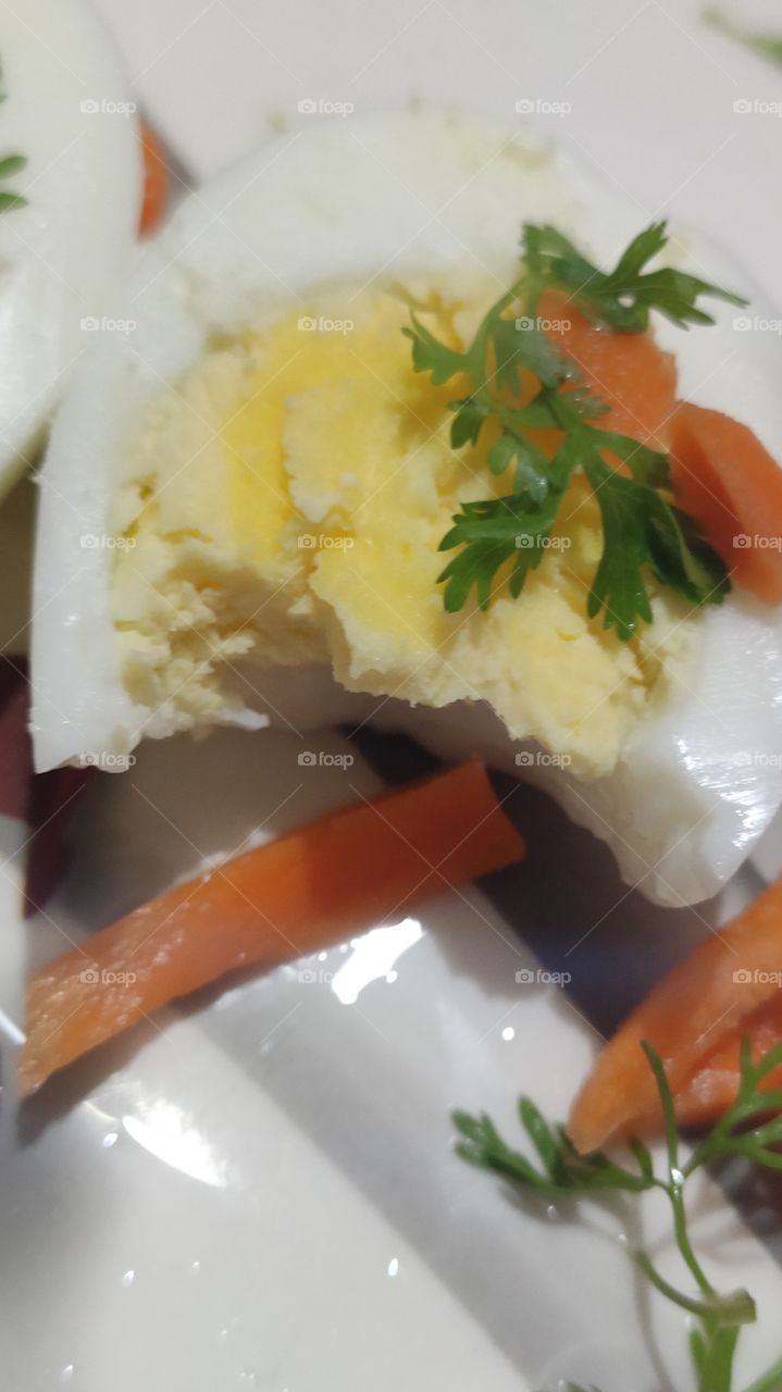 Nutritious healthy boiled eggs and carrots
