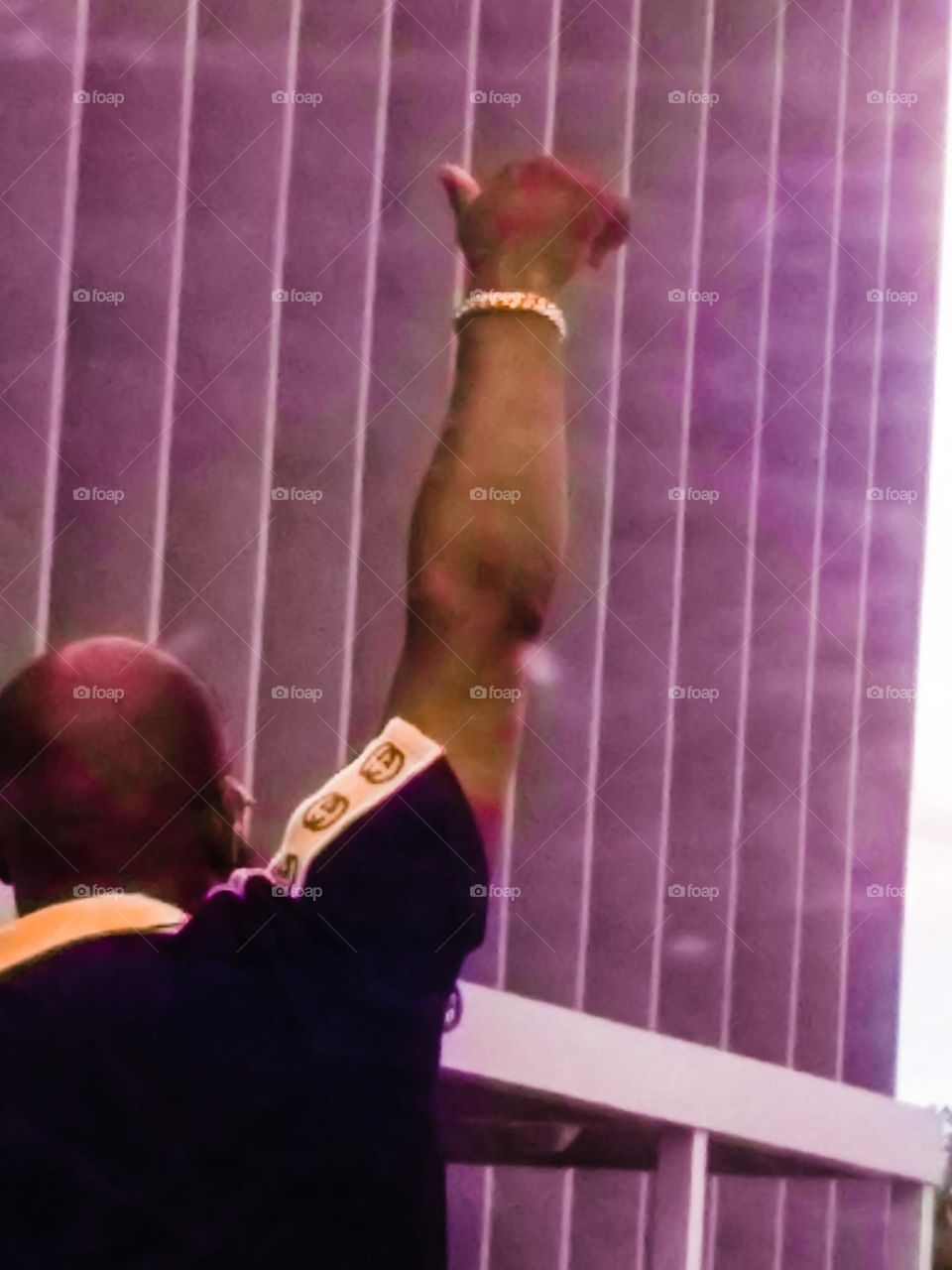 Schoolworker at grandson's school 🏫 doing after school duties📣 on campus. Thought this was a great catch, in terms of poses to catch someone in.