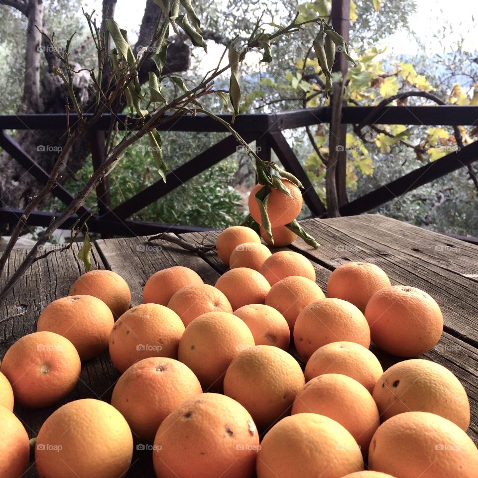 Mandarins on wooden table 