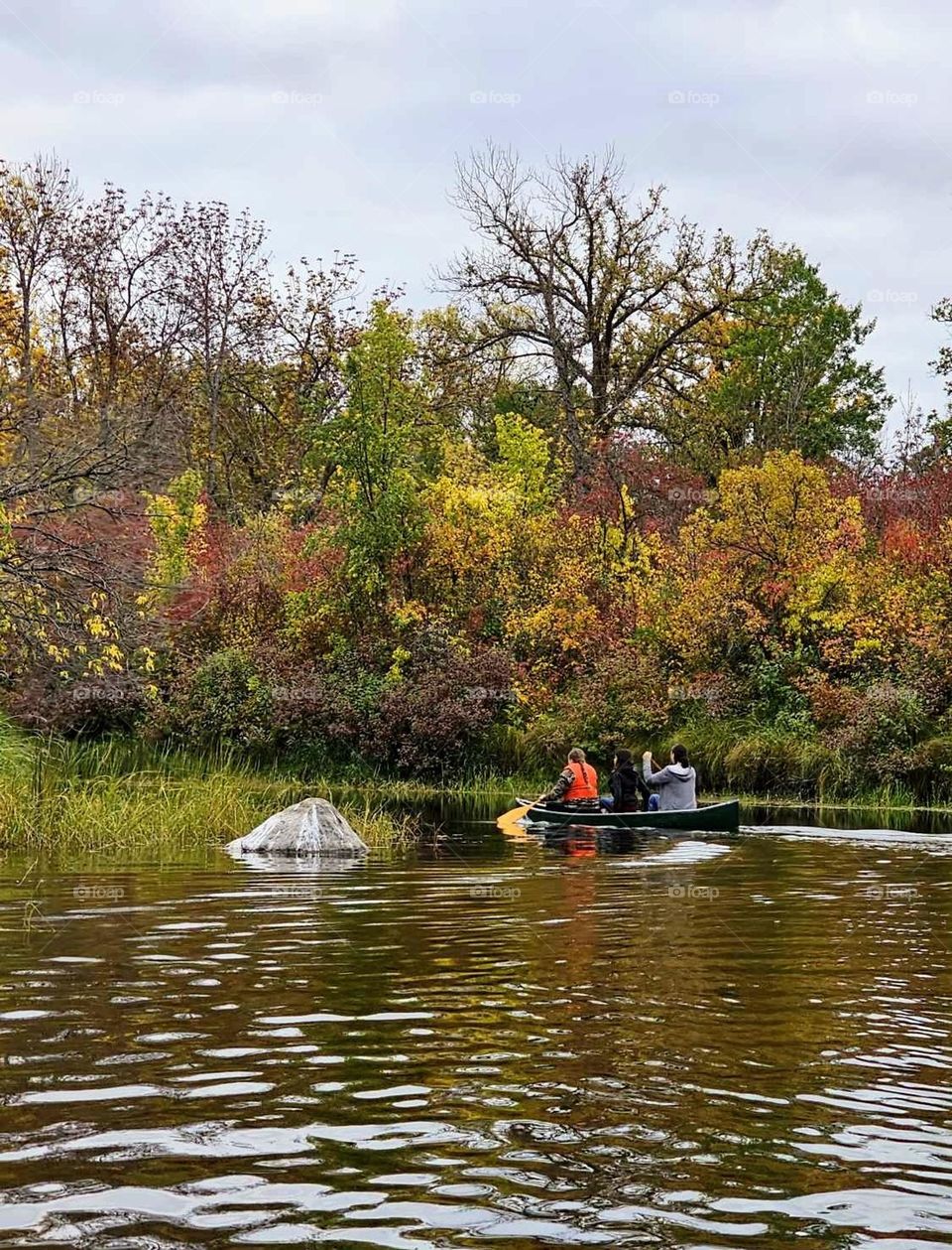 a beautiful fall day for a canoe ride