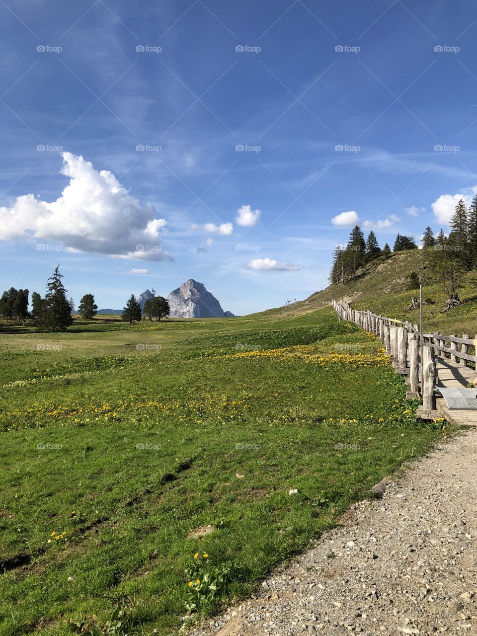 water flows, stream, waterfall, snow in the mountains, laughter, snow in hands, snow in holes, green grass, spring