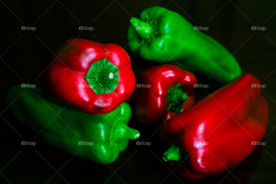 Still life shot of colorful bell peppers. This picture looks kind of like a painting.
