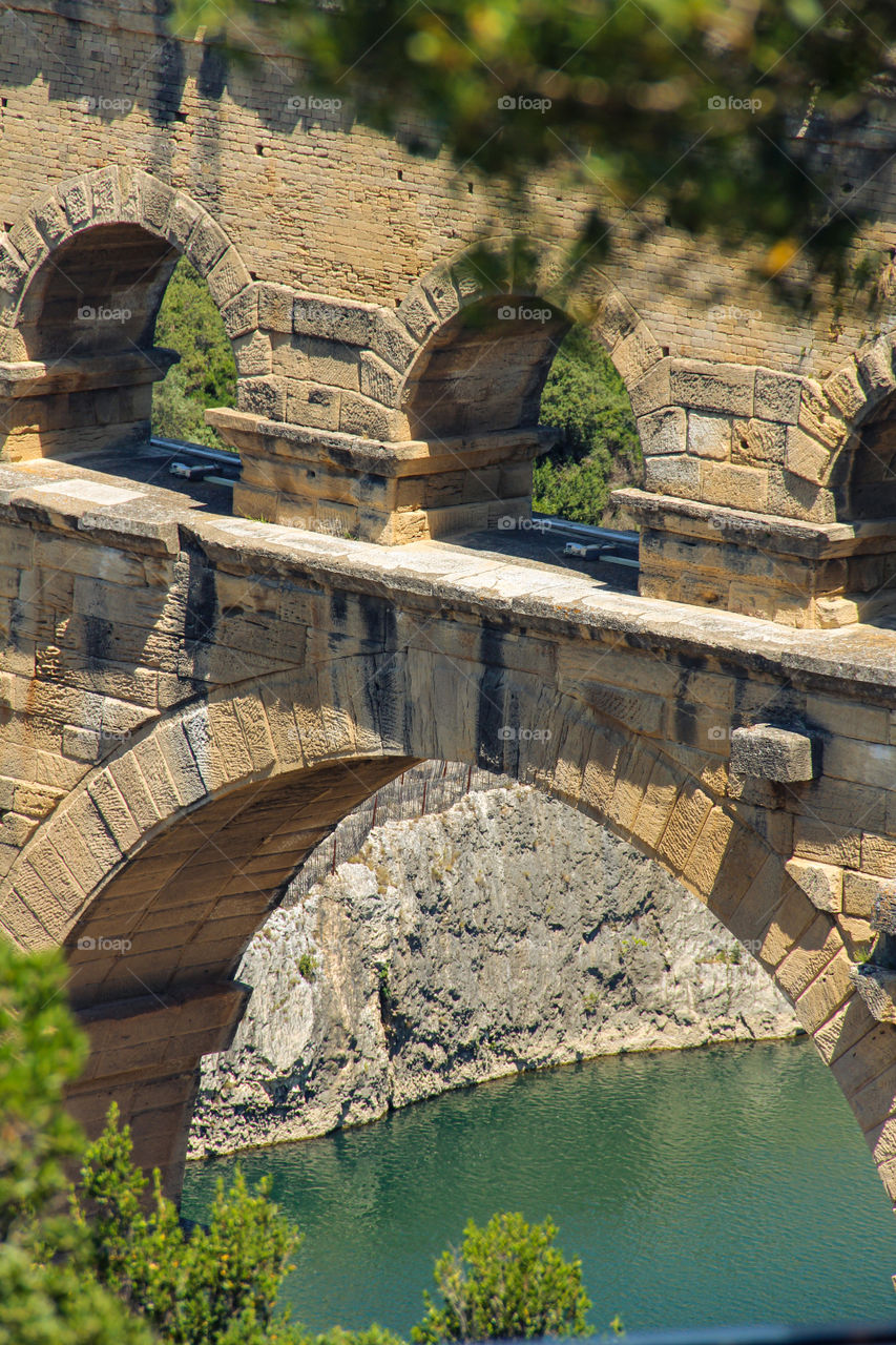 Bridge made of stone over a river