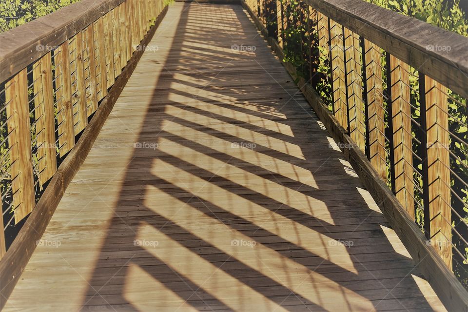 Shadows on the boardwalk