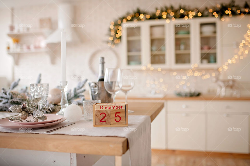 Christmas background with wooden block calendar with the date of December 25