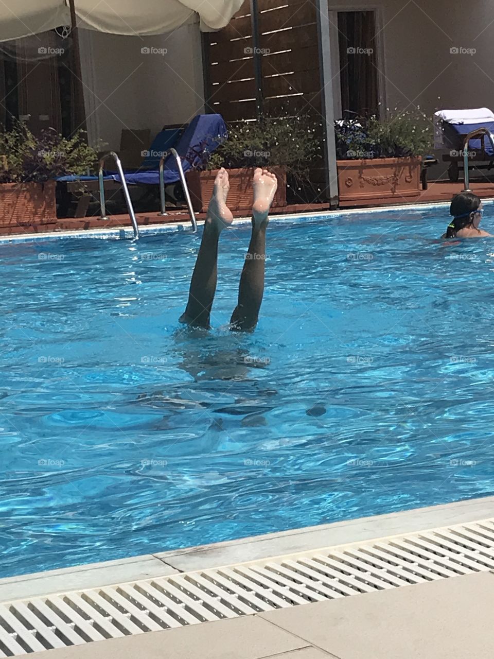plunge in the corfu pool