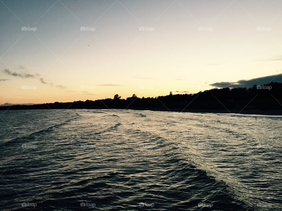 Sundowner in Scandinavia. Beach in Höllviken in Sweden sundown in Midsummer fiesta