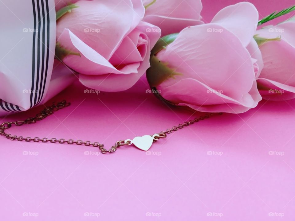 pink roses and pendant