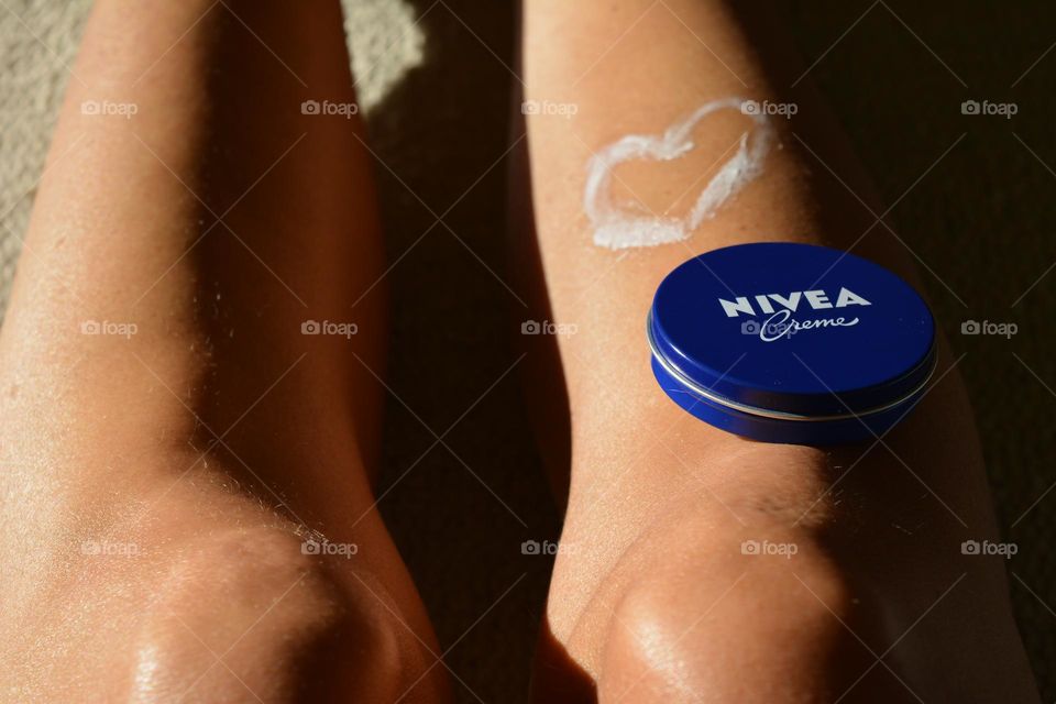 love Nivea cream , skin care, female legs