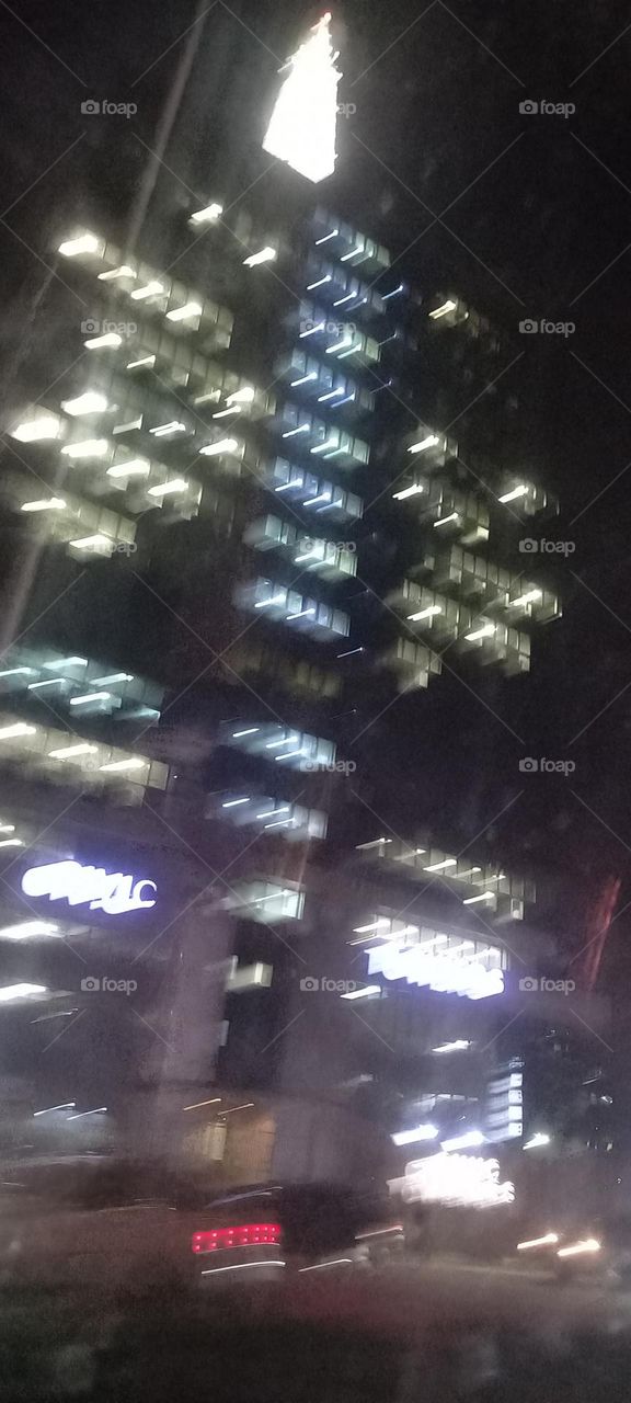 Twinkling windows , the beauty of evening light. Bask in the beauty of evening light with the view of light twinkling from these windows at night