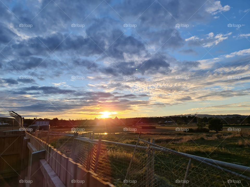 Fencing Sunset view of Wallan, Victoria, Melbourne, Australia Ugly temp fence