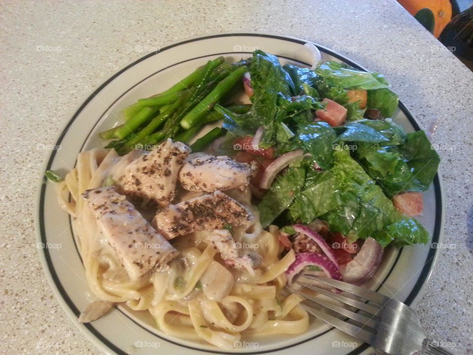 chicken linguini with asparagus and a salad