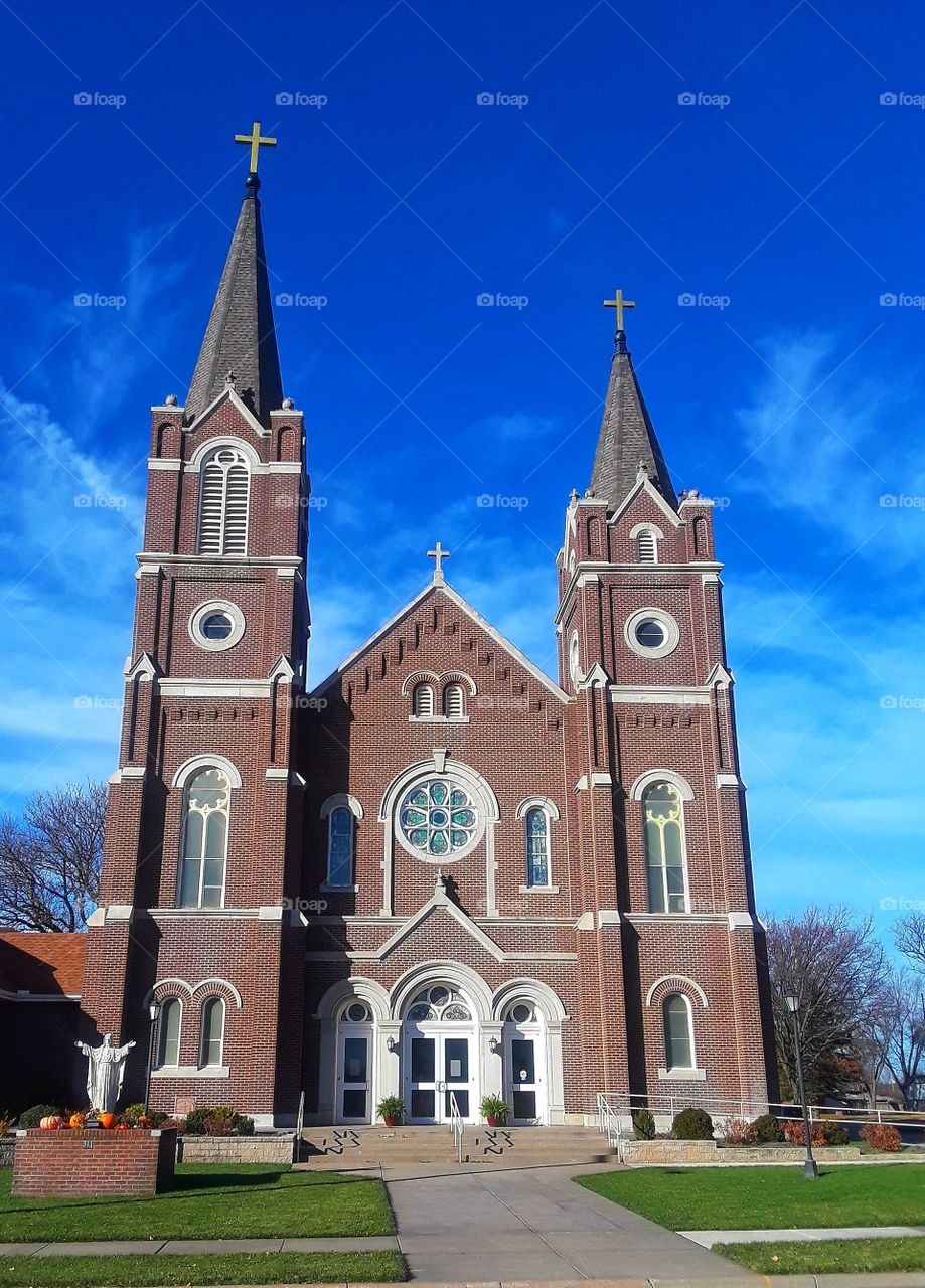 Large Catholic Church Against Blue Sky