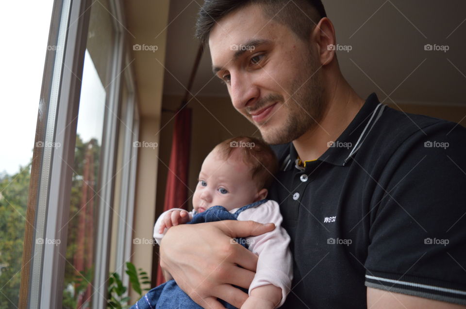 baby with his godfather