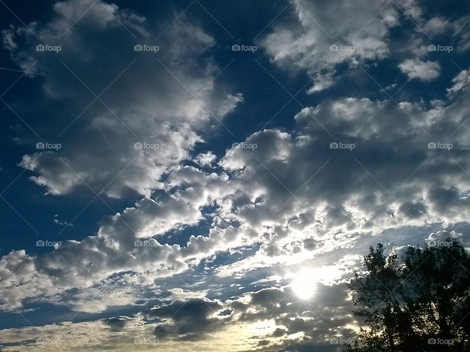 sun lit clouds