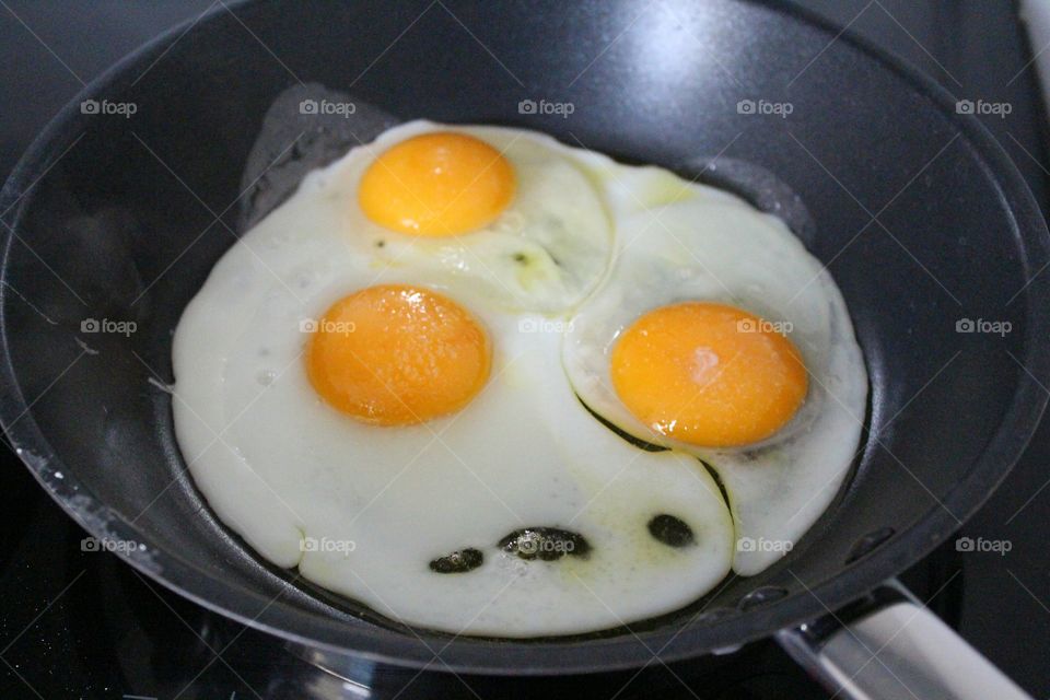 Egg yolk in frying pan