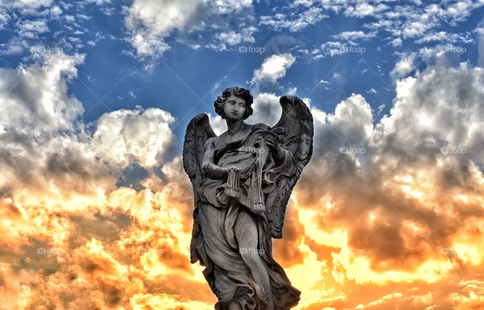 One of the angel statues on the Ponte Sant’Angelo, Rome, Italy.  