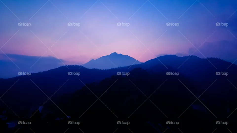 a mountain Full of greenery show a sign of happiness in human life