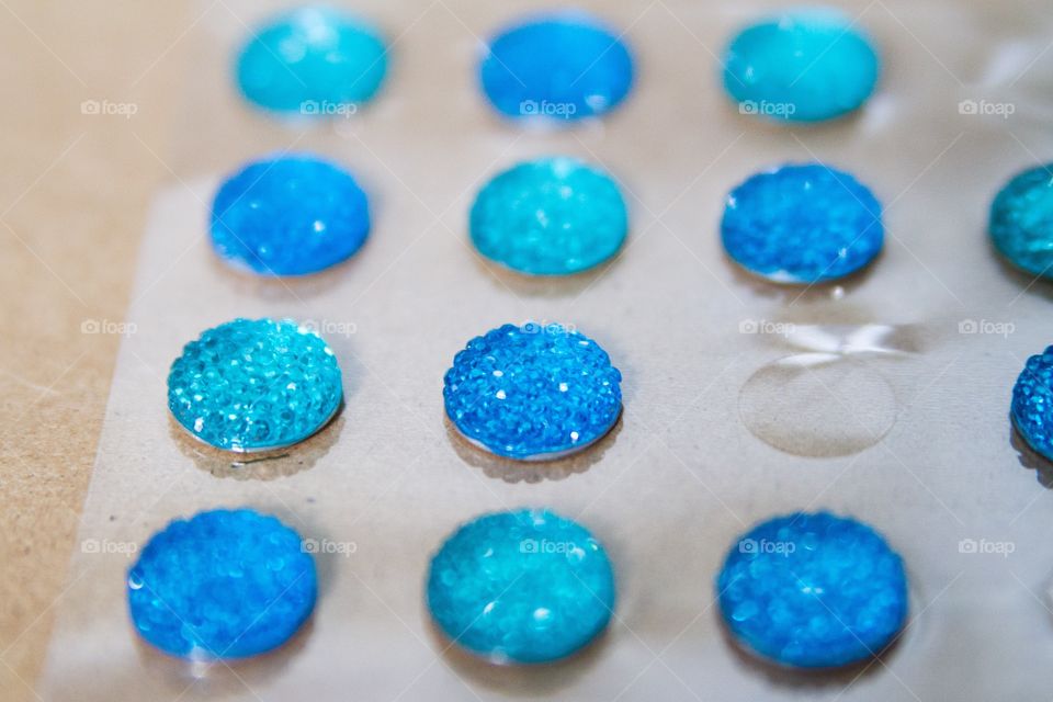 High angle view of blue gemstones