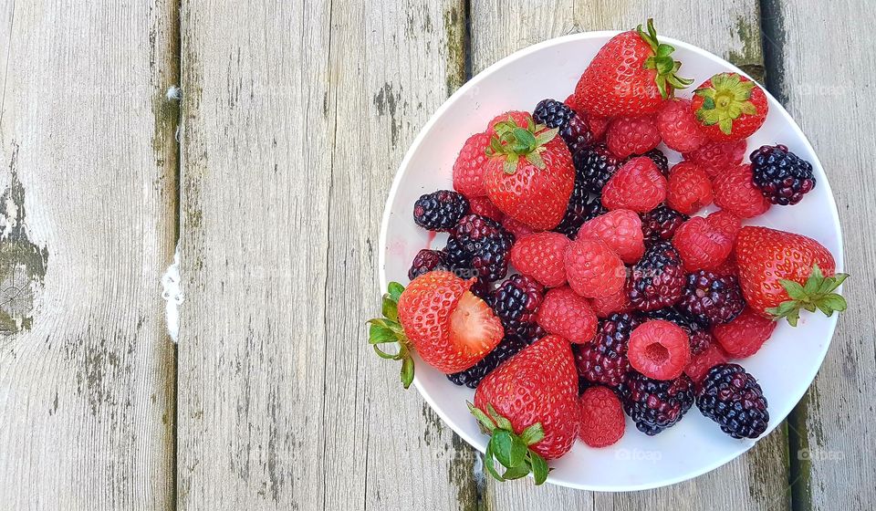 Berries in white plate
