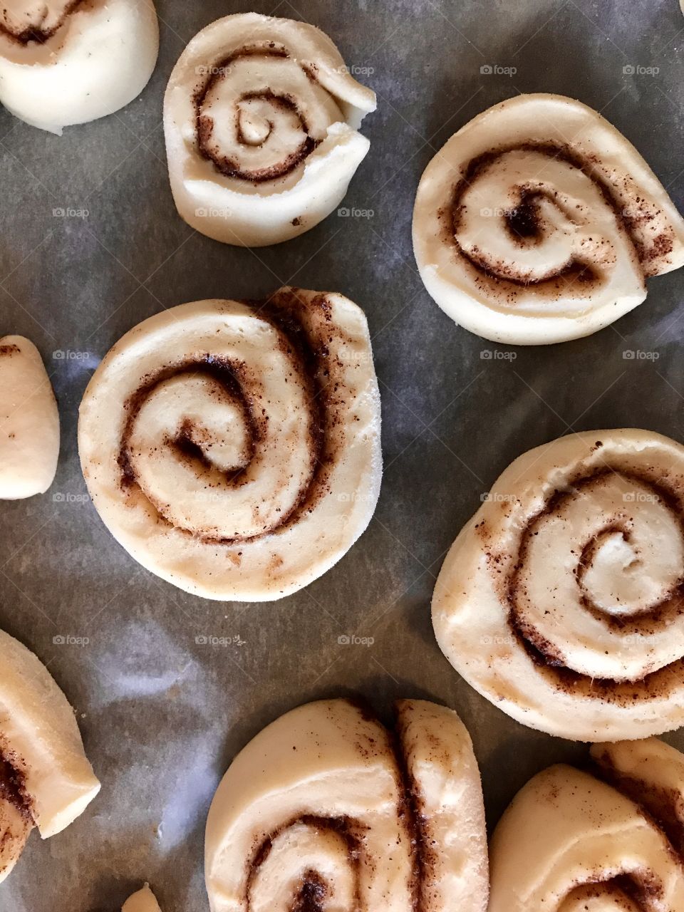 Uncooked pre- rolled cinnamon buns