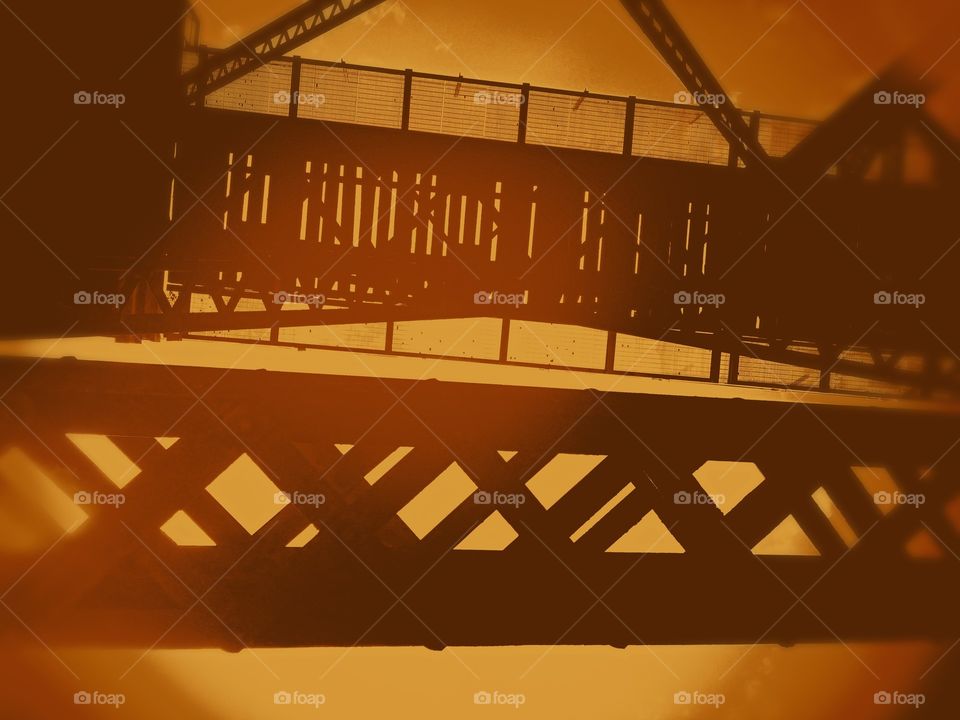 Orange and black railroad trusses