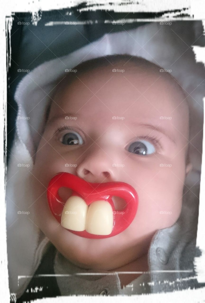 funny teeth. funny baby dummy